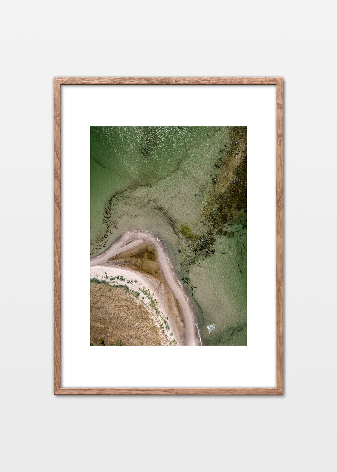 Dronefoto af Austre Strand og tangen mod Heligholmen, Gotland – Foto Martin Bay